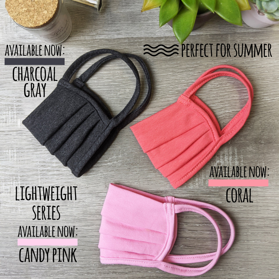 Charcoal gray, coral, and candy pink lightweight face masks. Perfect for the summer.
